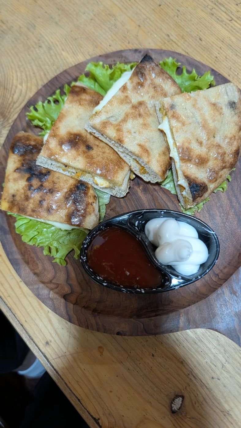 Home-baked stuffed bread with chutney